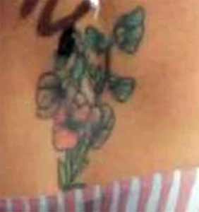 a cool tattoo on christina ricci's lower back